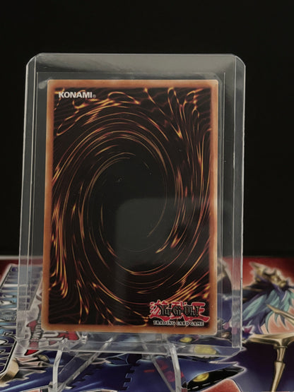 Trading card in a clear protective case on a dark background